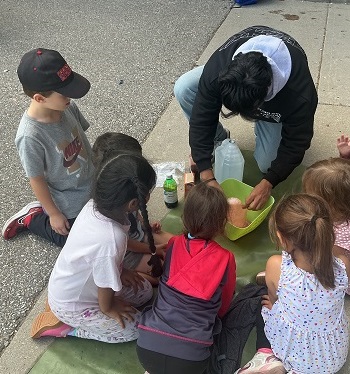 Educator supporting volcano experience