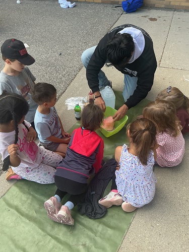 JKK children engaging in volcano experience