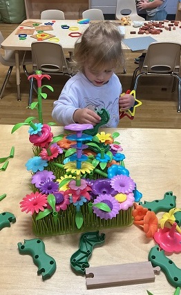 Child building with connectors