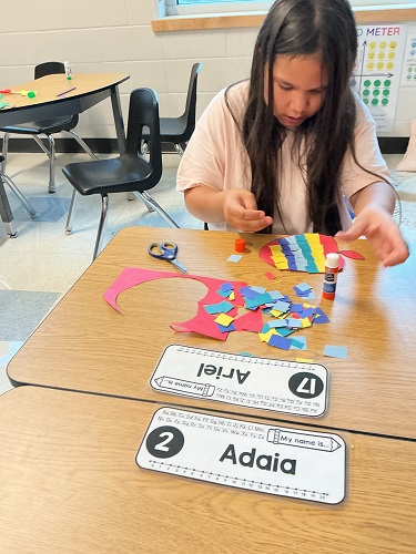 School age child creating their art