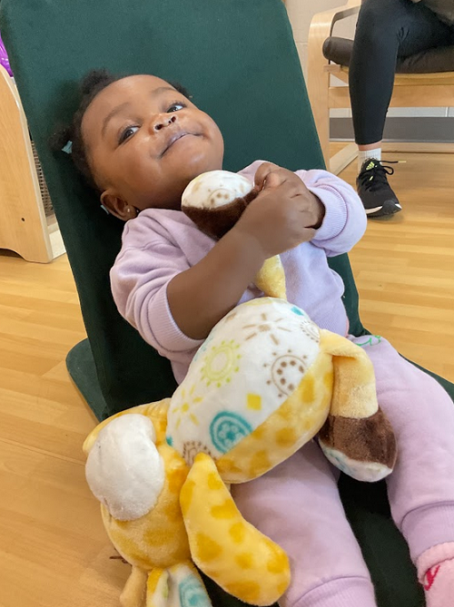 child with giraffe