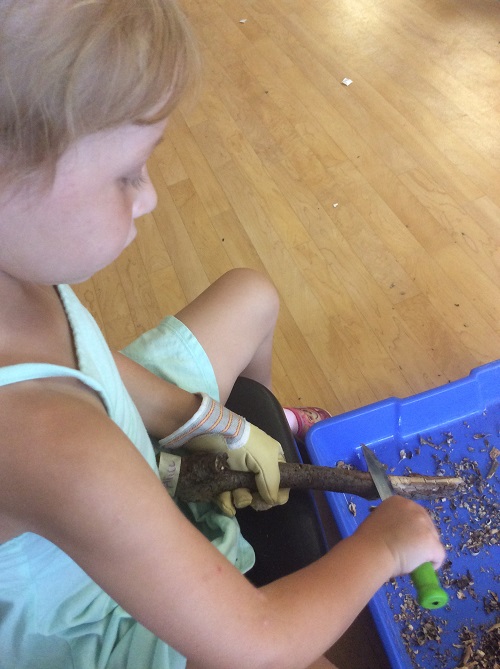 girl Whittling